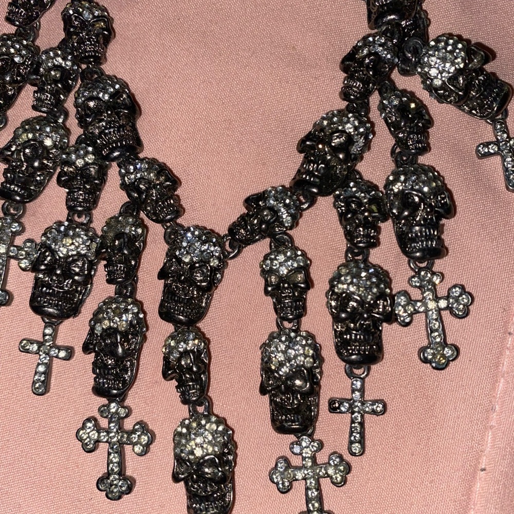 hematite necklace with lots of bling, skulls& crosses. 18 inch w/ 2” extender